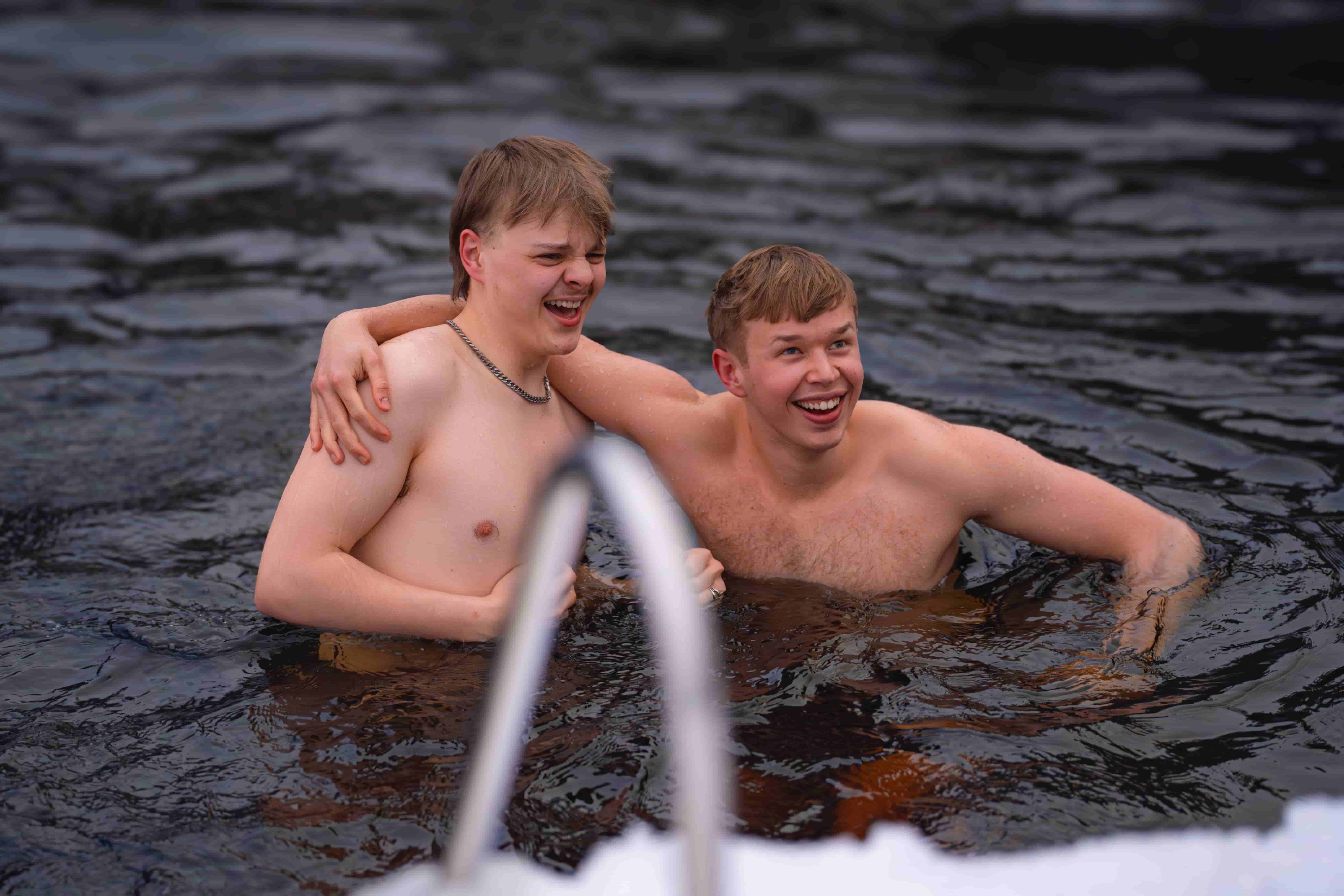 Two guys icebathing